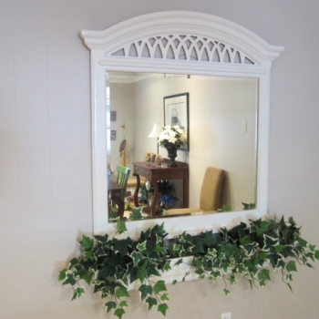 Mirror With Flower Box In Dining Room
